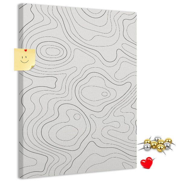 Memobord van kurk met abstracte lijnen en golven op de achtergrond