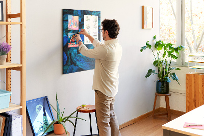 Memobord van kurk met nachtbladeren in verschillende tinten blauw