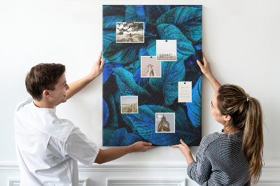 Memobord van kurk met nachtbladeren in verschillende tinten blauw