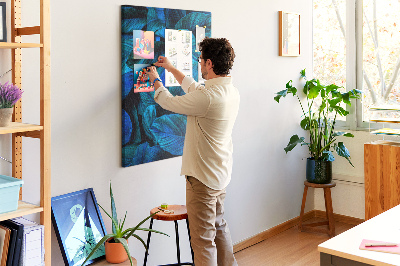 Memobord van kurk met nachtbladeren in verschillende tinten blauw
