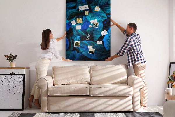 Memobord van kurk met nachtbladeren in verschillende tinten blauw