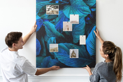 Memobord van kurk met nachtbladeren in verschillende tinten blauw