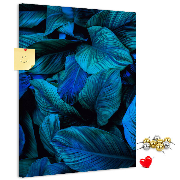 Memobord van kurk met nachtbladeren in verschillende tinten blauw