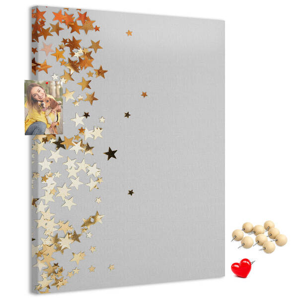 Kurk bedrukken met gouden en zilveren sterren op een grijze achtergrond