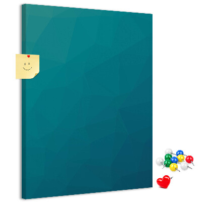 Kurken prikbord met geometrische blauwtinten op de achtergrond