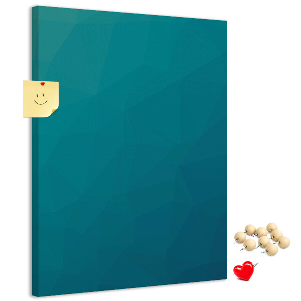 Kurken prikbord met geometrische blauwtinten op de achtergrond