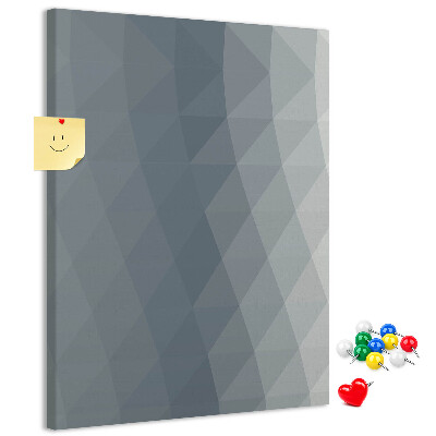 Kurken memobord met geometrisch patroon in grijstinten