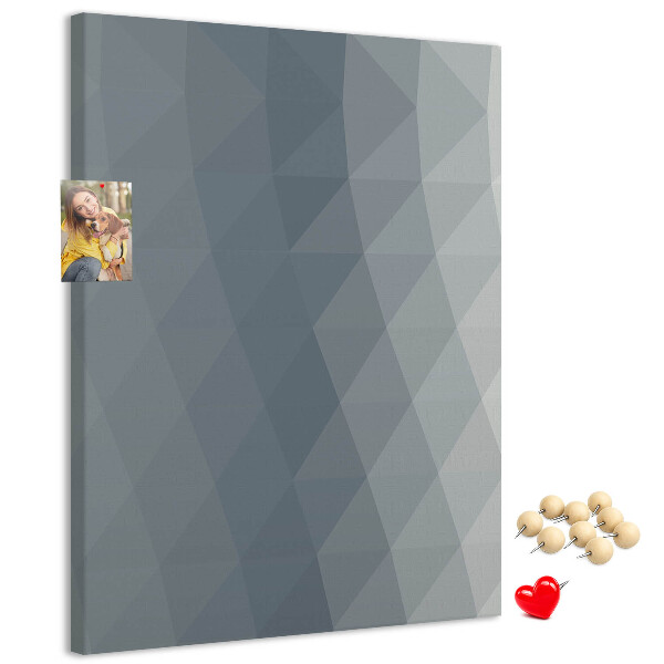 Kurken memobord met geometrisch patroon in grijstinten