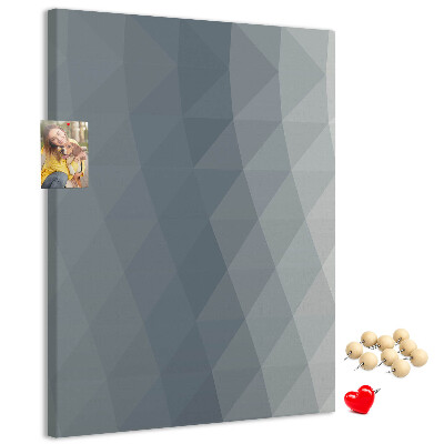 Kurken memobord met geometrisch patroon in grijstinten