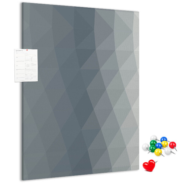 Kurken memobord met geometrisch patroon in grijstinten