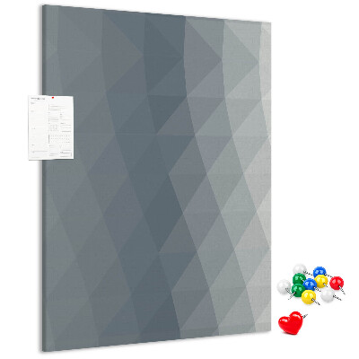 Kurken memobord met geometrisch patroon in grijstinten