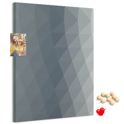 Kurken memobord met geometrisch patroon in grijstinten
