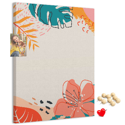 Kurken memobord met een print van tropische bladeren en bloemen in pasteltinten