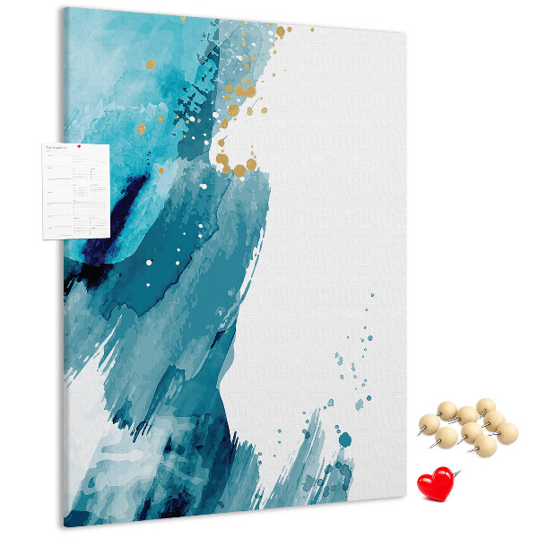 Prikbord van kurk met een abstract ontwerp in blauwtinten met gouden accenten