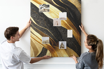 Memobord van kurk met goud en zwartkleurige golvende stofstructuur