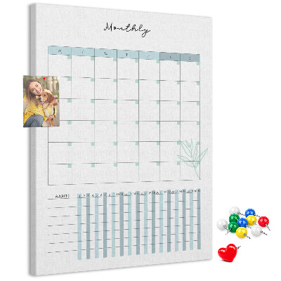 Kurken memobord met maandelijkse planning en bloemenprint