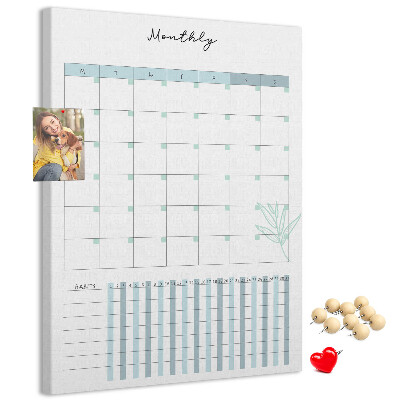Kurken memobord met maandelijkse planning en bloemenprint