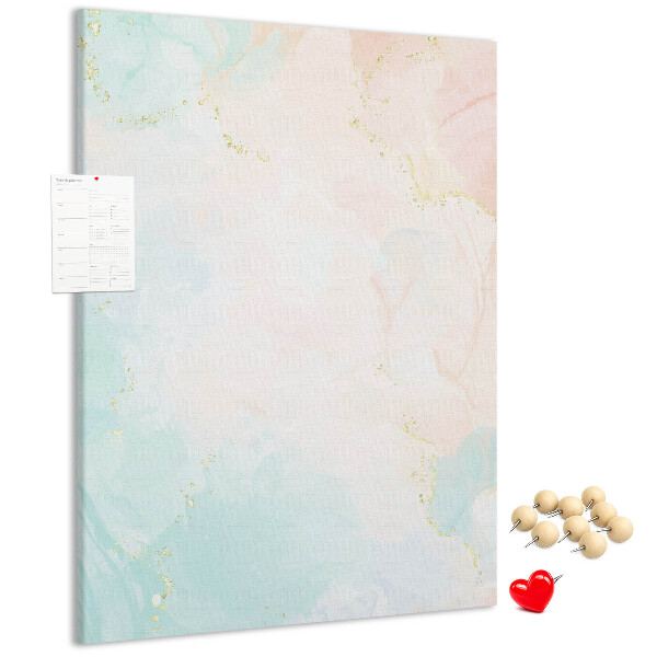 Kurken prikbord met fijn stippenpatroon in pastelkleuren en gouden accenten
