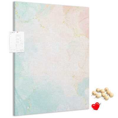 Kurken prikbord met fijn stippenpatroon in pastelkleuren en gouden accenten
