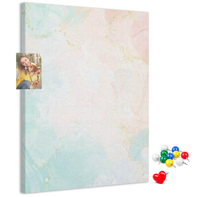 Kurken prikbord met fijn stippenpatroon in pastelkleuren en gouden accenten