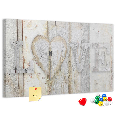 Kurk prikbord met houten plaquette met het woord 'liefde'