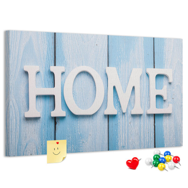 Prikbord stijlvol HOME-opschrift op een blauwe achtergrond