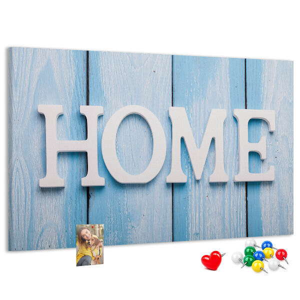 Prikbord stijlvol HOME-opschrift op een blauwe achtergrond