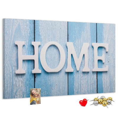 Prikbord stijlvol HOME-opschrift op een blauwe achtergrond