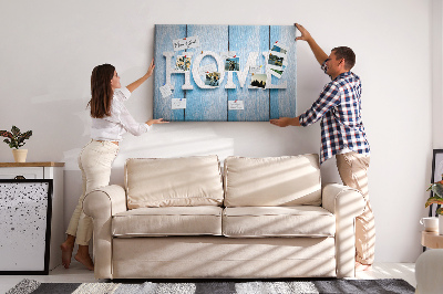 Prikbord stijlvol HOME-opschrift op een blauwe achtergrond