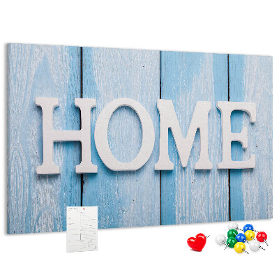 Prikbord stijlvol HOME-opschrift op een blauwe achtergrond