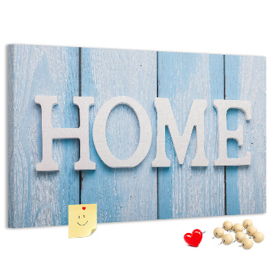 Prikbord stijlvol HOME-opschrift op een blauwe achtergrond