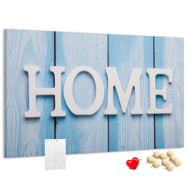 Prikbord stijlvol HOME-opschrift op een blauwe achtergrond