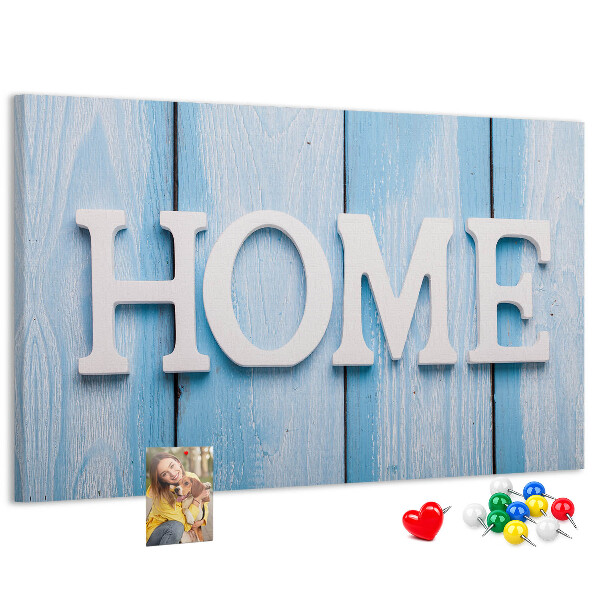 Prikbord stijlvol HOME-opschrift op een blauwe achtergrond