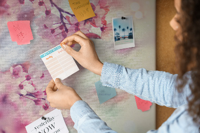 Prikbord met afbeelding van bloemtakken in pasteltinten