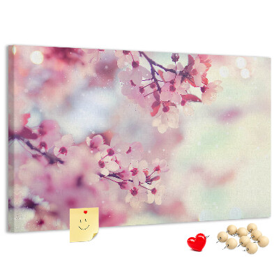Prikbord met afbeelding van bloemtakken in pasteltinten