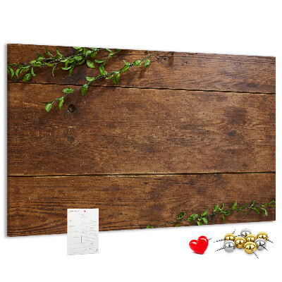 Prikbord natuurlijk hout met groene takken