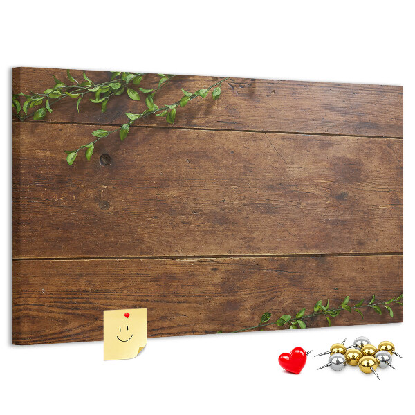 Prikbord natuurlijk hout met groene takken