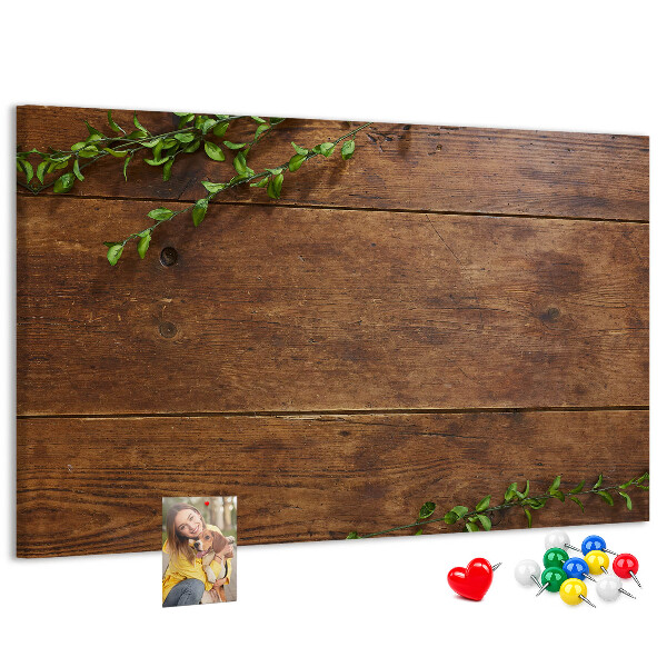 Prikbord natuurlijk hout met groene takken
