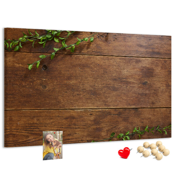 Prikbord natuurlijk hout met groene takken