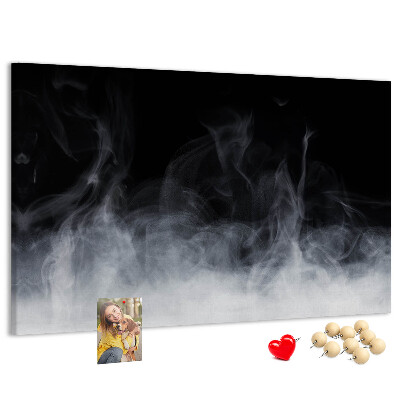 Prikbord sensuele dans van mist op een zwarte achtergrond