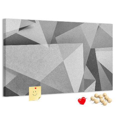 Prikbord met abstracte grijze en zwarte geometrische vormen