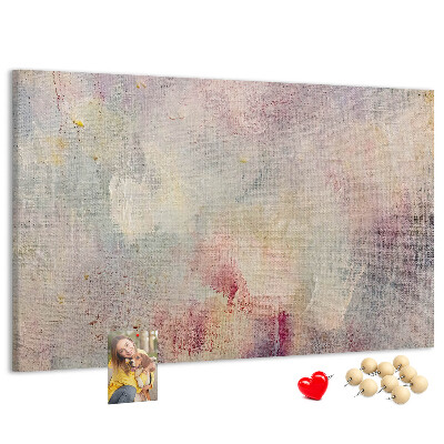 Kurken prikbord met een achtergrond in subtiele pastelkleuren