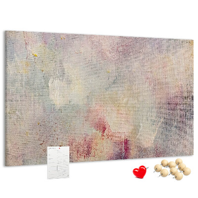Kurken prikbord met een achtergrond in subtiele pastelkleuren