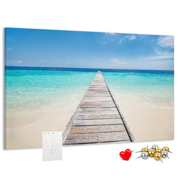 Prikbord met een rustige pier in een tropisch paradijs