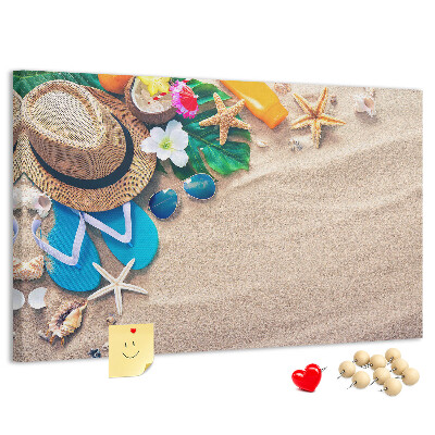 Kurken prikbord met zomerse strandherinneringen als decoratie