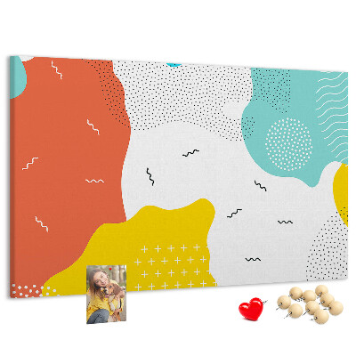 Prikbord met kleurrijke abstracte vormen en patronen