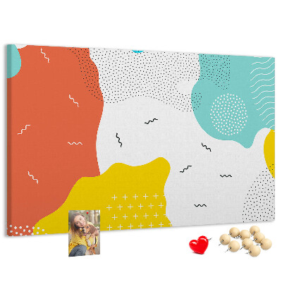 Prikbord met kleurrijke abstracte vormen en patronen