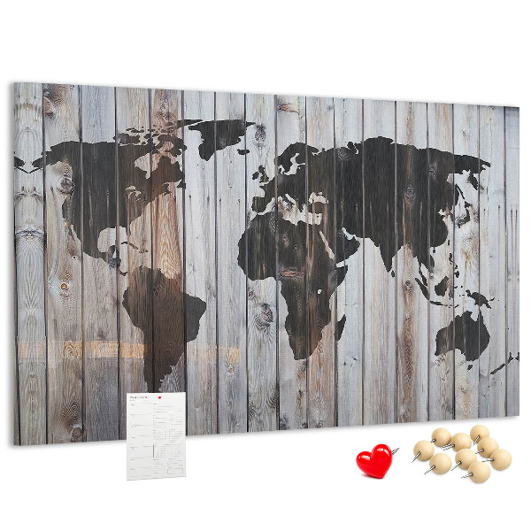Prikbord wereldkaart op een achtergrond van houten planken