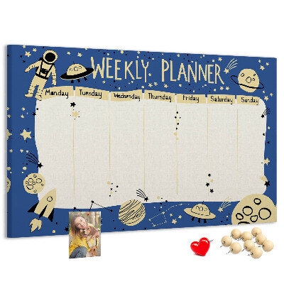Kurkbord kosmische weekplanner met planeten en sterren