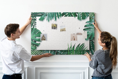 Kurken prikbord met een motief van tropische groene bladeren